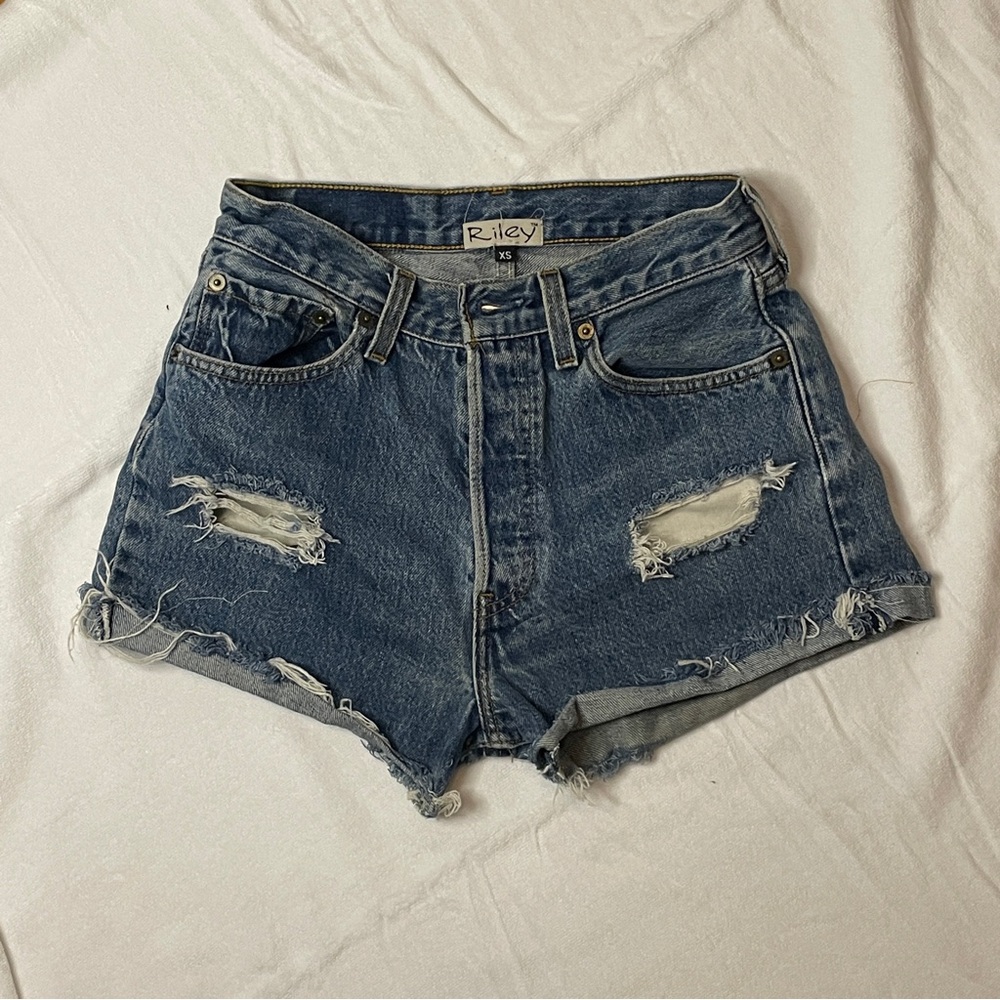 Distressed denim shorts